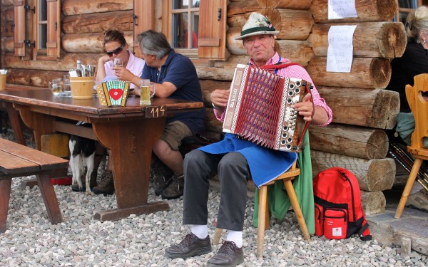 Being serenaded while eating my dumplings at the Gostner Mountain Hut in Alpe di Siusi. Being serenaded while eating my dumplings at the Gostner Mountain Hut in Alpe di Siusi.