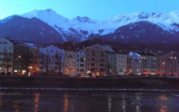 Is there anything more romantic than historic buildings sandwiched between a river and mountains in Innsbruck, Austria? Is there anything more romantic than historic buildings sandwiched between a river and mountains in Innsbruck, Austria?