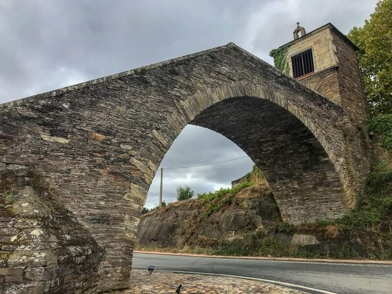 you'll stay in historic towns and villages like Portomarin when you walk the last 100 km of the Camino de Santiago