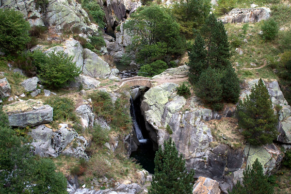 Waterfall and bridge in the Vall de Nuria in the Pyrenees, Catalonia, Spain
