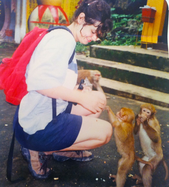 Me feeding two juvenile monkeys who were begging for food