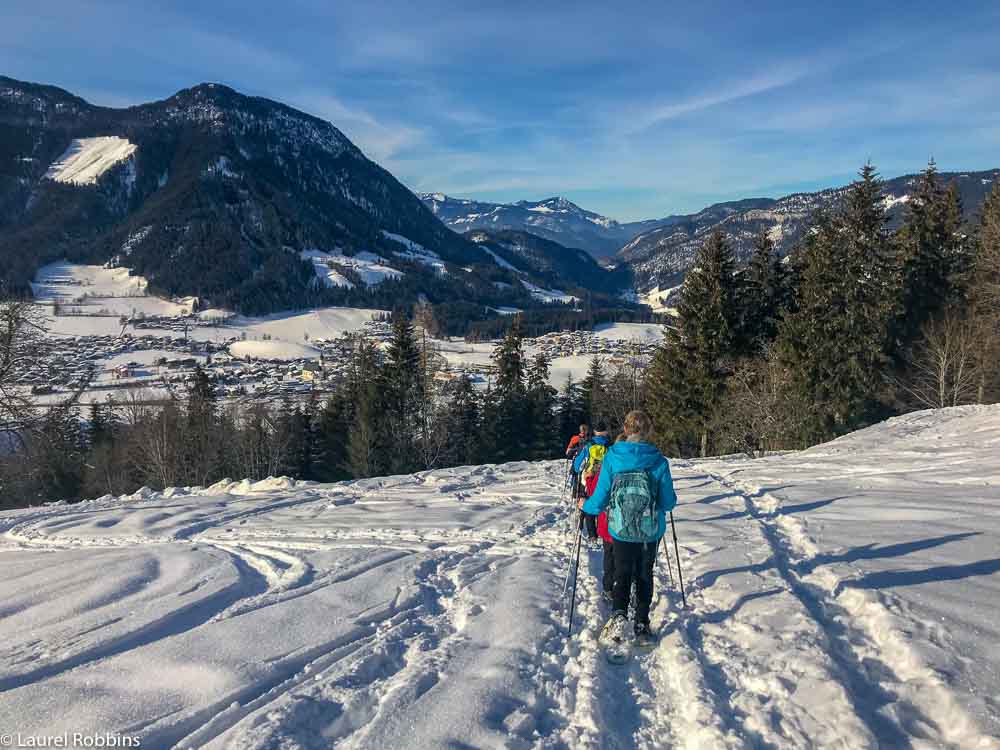 Snowshoers on a guided snowshoe hike in Wilder Kaiser, Austria