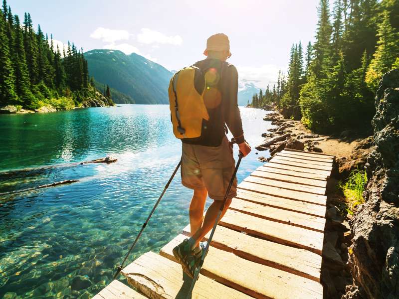 hiker walking near the lake