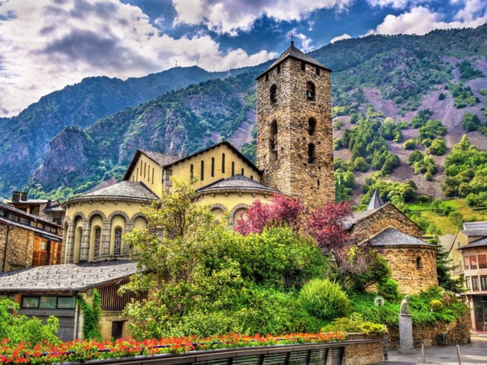 Stone bell tower of the old church in Andorra la Vella, beside Escaldes-Engordany where the tour finishes