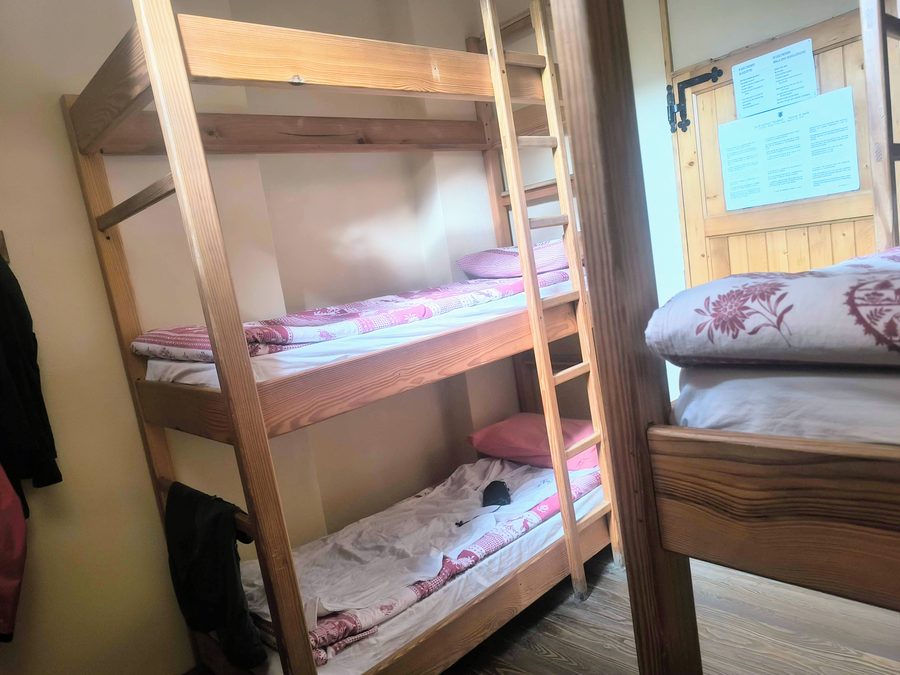 Dormitory accommodation inside Rifugio Vittorio Sella on the Gran Paradiso traverse