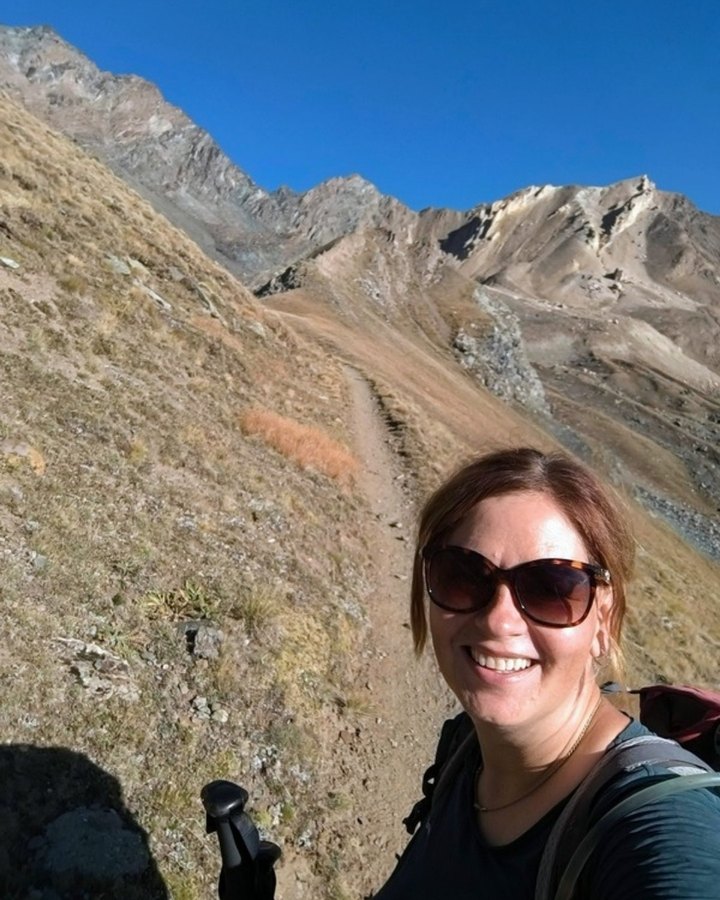 Laurel Robbins, founder of Monkeys and Mountains Hiking Tours, on a mountain trail