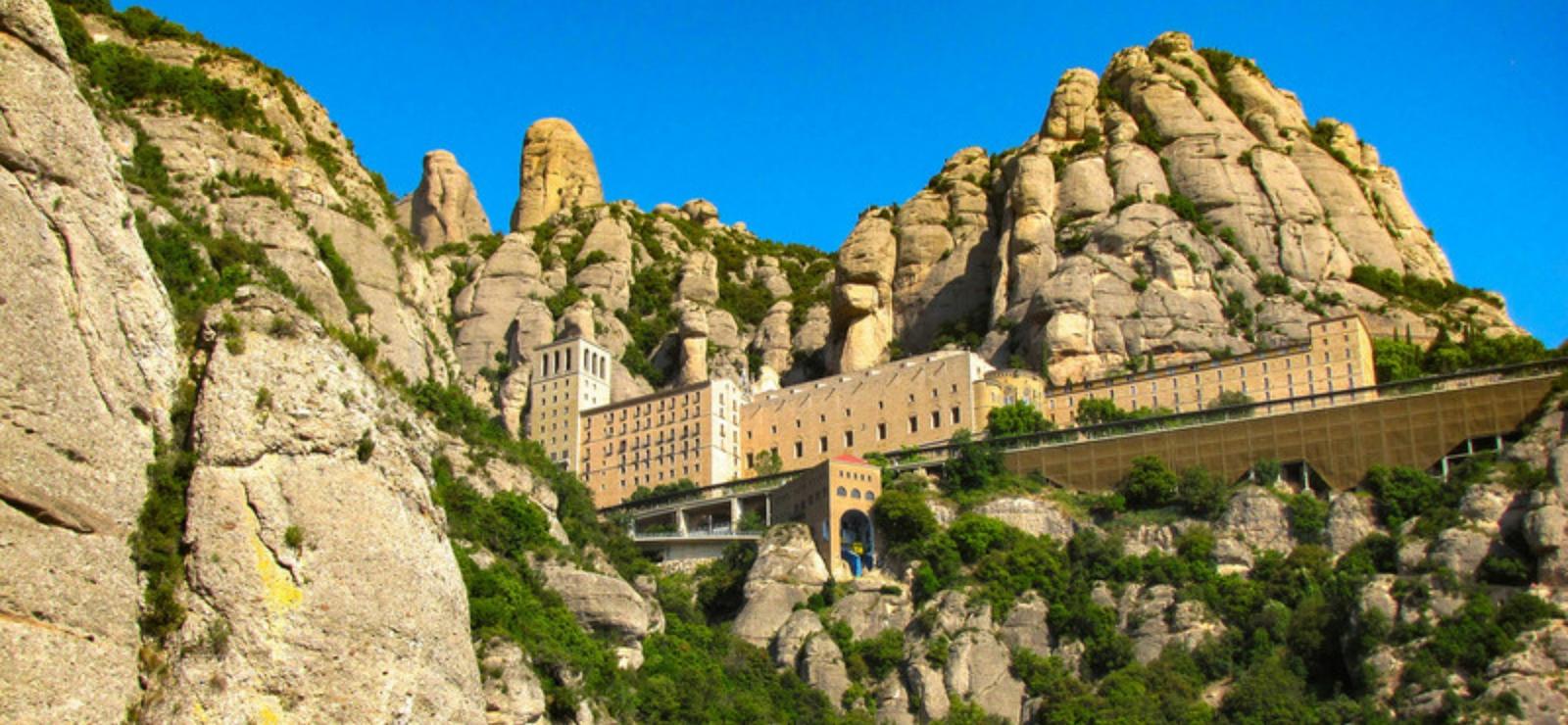 The monastery at Montserrat below its rock towers, the finish of the self-guided Mountains of Catalonia hiking tour