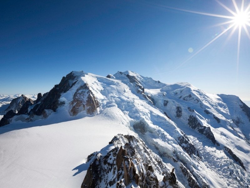The snow ridge leading to the summit of Mont Blanc seen from the Aiguille du Midi in the French Alps