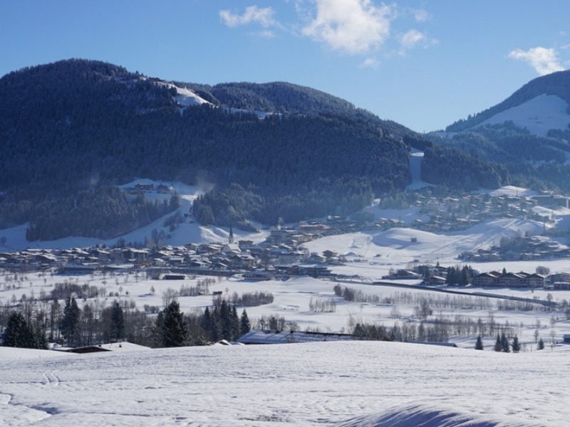 Ellmau village in winter, where the hotels sit between the Hartkaiser lift and the village center, Tyrol, Austria