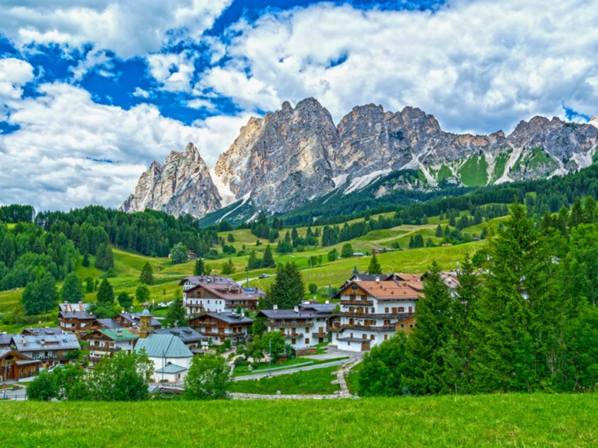 Cortina d'Ampezzo below the Dolomites peaks, reached by direct bus from Venice Marco Polo airport