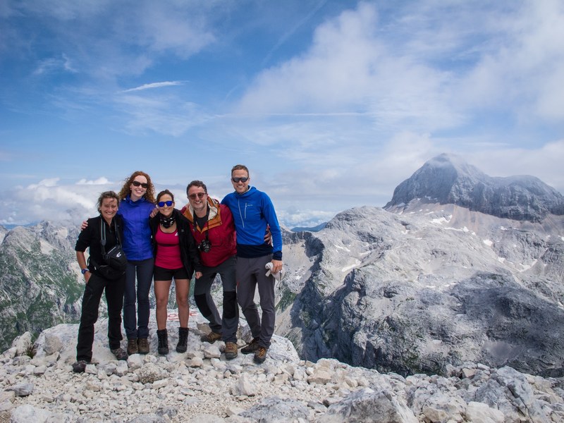 Group of hikers on a julian alps summit