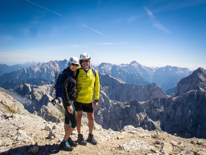 Two hikers on a julian alps summit